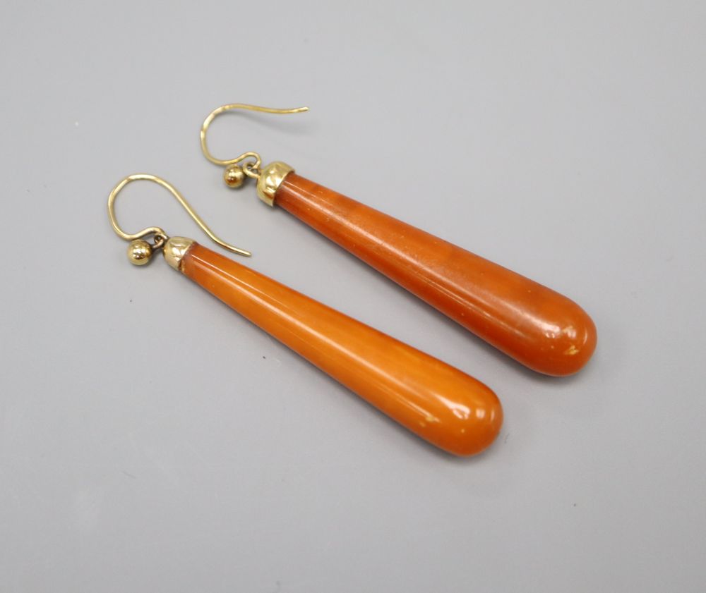 A pair of gold mounted amber drop earrings, drops 4.5cm